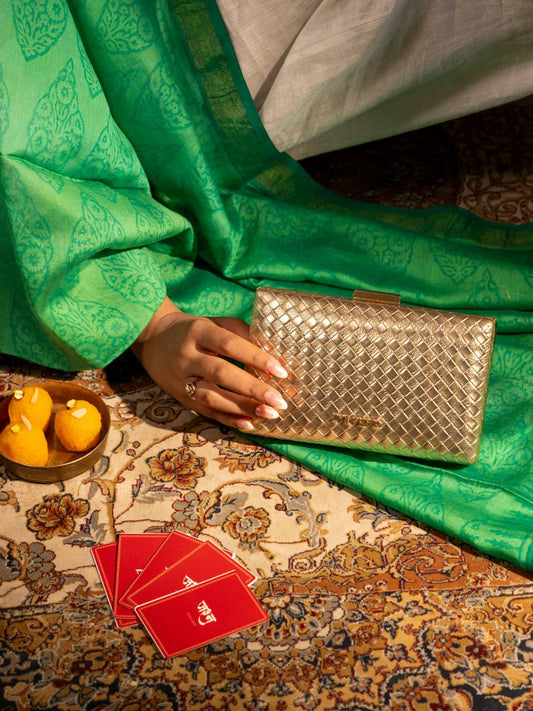 Astra Clutch Sling Gold